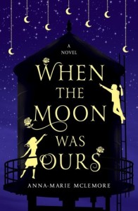 Cover of When the Moon Was Ours by Anna Marie McLemore. Illustration of a silhouette of a water tower at night. Moons hang down from the top of the book. A silhouette of a boy pointing to the sky on the right, and a girl lifting her hand towards him. Illustrations of roses decorate the title text.