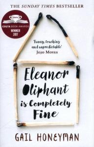 Cover of Eleanor Oliphant is Completely Fine by Gail Honeyman. Half-burnt matchsticks arranged in a simple house shape (a square with a triangle on top). The title in a brush font inside the house.