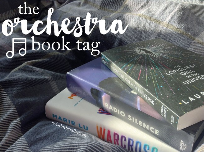 The words 'orchestra book tag' with a music note icon beside. A photo of the books The Loneliest Girl in the Universe, Radio Silence and Warcross in a pile on a checked blue duvet cover.