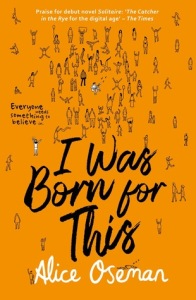 Cover of I Was Born For This by Alice Oseman. Illustrations of many small people on an orange background. The title in a brush font.