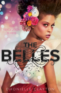 Cover of The Belles. A glamorous brown-skinned person with flowers in their hair looks back at the camera. The subtitle reads 'the revolution is here' and the title text is disintegrating.